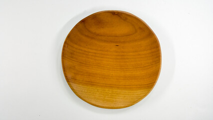 Set of cutlery and kitchen utensils made of wood. Isolated.