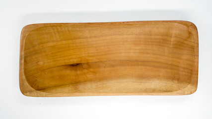 Set of cutlery and kitchen utensils made of wood. Isolated.