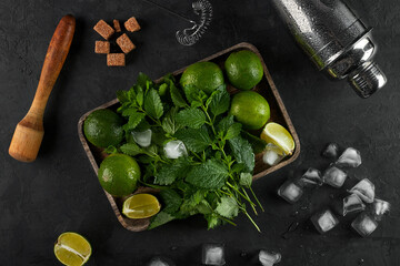 Summer Refreshing Classic Mojito Cocktail. Ingredients: lime, mint, cane sugar, ice. Shaker, strainer. Cuban national drink.