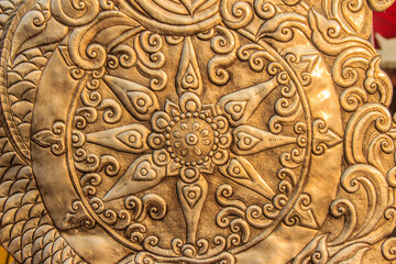 Beautiful Thai style silver carving art pattern on the Buddhist church wall at Wat Srisuphan in Chiang mai, northern Thailand, Buddhist church built from genuin silver metal.