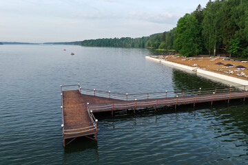 boat mooring on the river at sunrise filmed from a drone