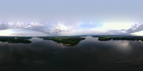 panoramic view of the river with floating boats and beautiful clouds shot from a drone