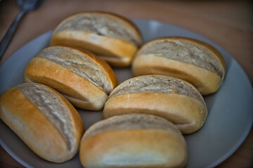 Fototapeta na wymiar Freshly baked rolls from the oven
