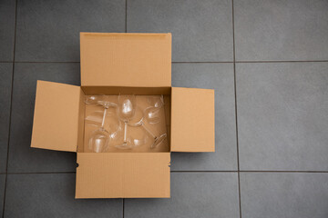 Broken plates or broken glass put in box in the kitchen. The concept of an accident in the kitchen...