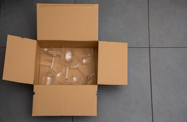 Broken plates or broken glass put in box in the kitchen. The concept of an accident in the kitchen...