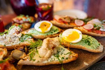 Spanish sandwiches on a platter at a restaurant
