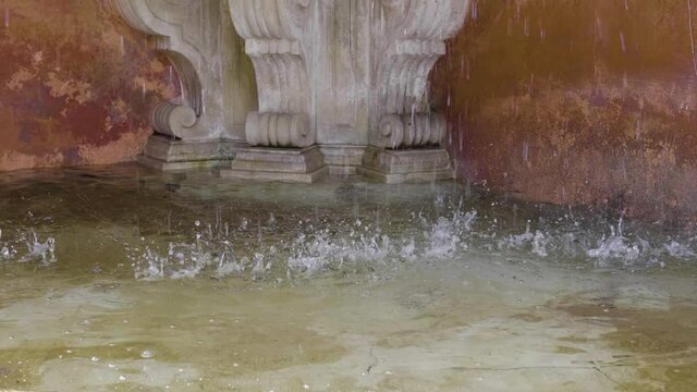Falling water from the fountain in the Jewish quarter of Seville
