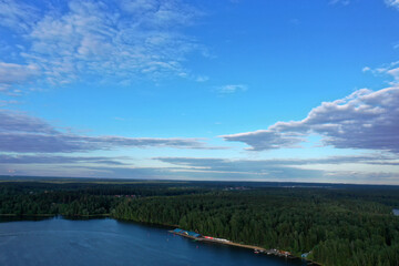 panoramic view of the river with floating boats and beautiful clouds shot from a drone