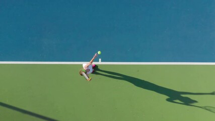 4K aerial top-down view of a young female sportsman during her practice. A close-up of a girl...
