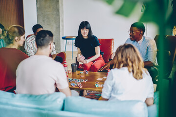 Multiethnic group of people playing in room