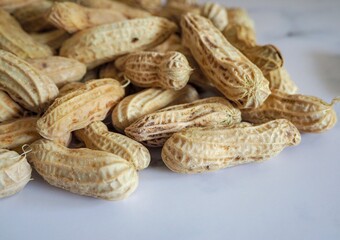 Peanut good natural sources of protein and healthy snacks for weight loss. Peanut on white background
