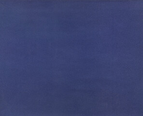 Blue background. Velvet fleecy paper texture. Closeup