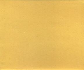 Yellow background. Velvet fleecy paper texture. Closeup