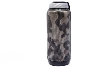 Wireless bluetooth color camouflage military column on a white background. The speaker is upright, the volume wheel and the control panel are on top