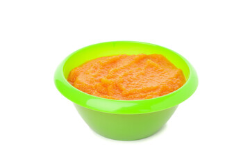 Bowl with healthy baby food isolated on white background