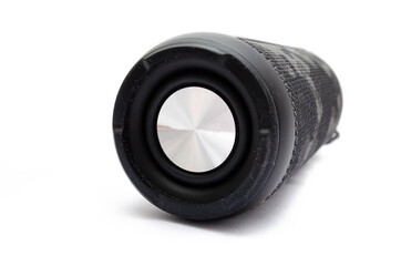 Wireless bluetooth color camouflage military column on a white background. The speaker lies on the...