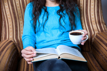 Obraz premium woman hand coffee and book