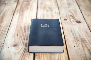 Holy Bible on the wooden table