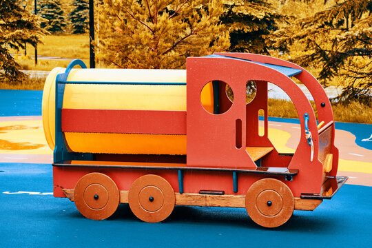 Toy concrete mixer on the playground, children's construction equipment close-up