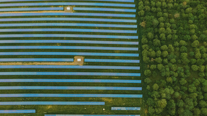 Solar panels on half frame and wood. Blue solar panels. background of photovoltaic modules for renewable energy.