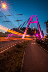 Night railway traffic on Wladyslaw Jagiello bridge in Bydgoszcz. Niht city scape. Long exposure.