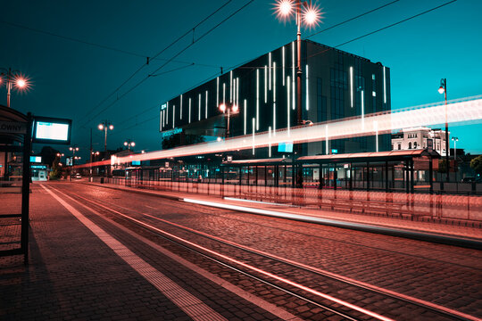Main train station in Bydgoszcz after sunset. Blue hour. Moder train station illuminated by city lights.