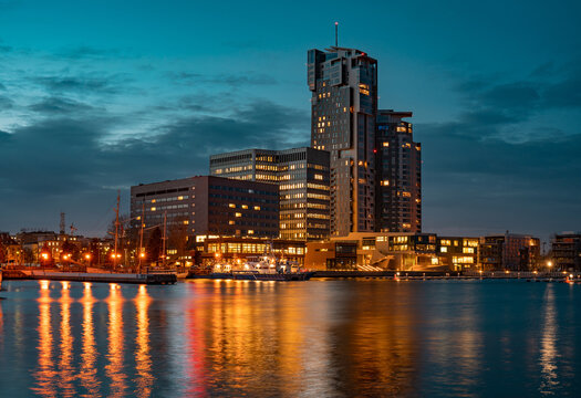 Modern architecture of Sea Towers skyscraper at night in Gdynia, Poland. 