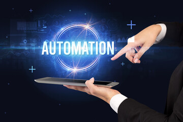 Close-up of a touchscreen with AUTOMATION inscription, new technology concept