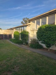 aged white buildings at golden hour