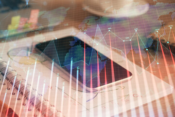 Double exposure of forex chart drawing and cell phone background. Concept of financial data analysis