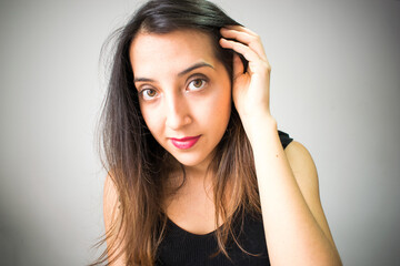 Fototapeta premium Young Woman wearing Black T-shirt and Red Lipstick 