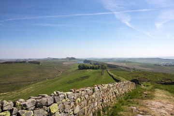 A section of Hadrian's Wall, an ancient Roman defensive fortification, in Cumbria England. 