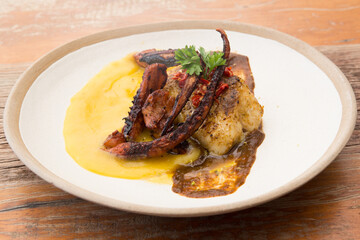 white fish and octopus with baroa potato pure
