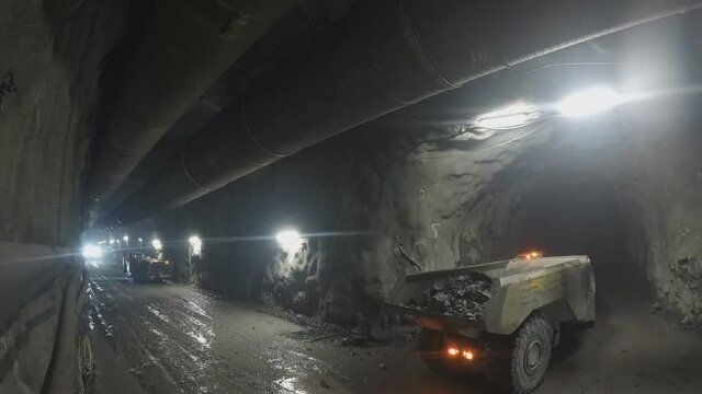 Work view of machinery in an underground diamond mine (time-lapse)