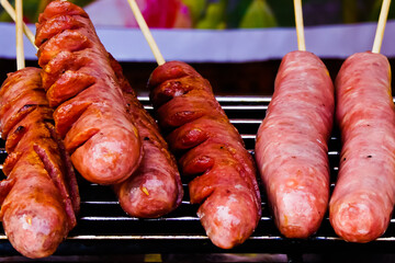Grilled sausages on wood stick