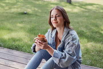 Thoughtful lady with a cup of tea