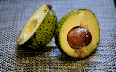 salvador, bahia / brazil - june 15, 2020: halved avocado fruit is seen in a kitchen in the city of...