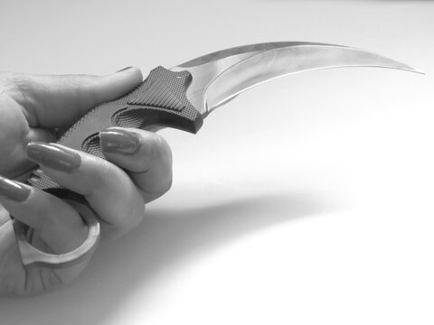 hand and knife switchblade