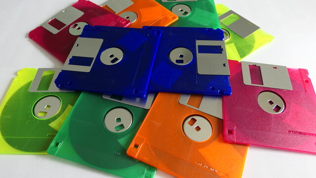 colorful floppy disks on white background