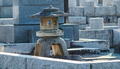 Fototapeta premium Stone lantern at a Japanese graveyard