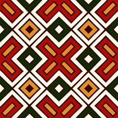 Seamless pattern in Christmas traditional colors. Repeated geometric forms bright ornamental abstract background.