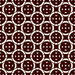 Ethnic, tribal wallpaper. Repeated segmented circles seamless pattern. Openwork ornament. Delicate ornamental background
