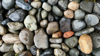 stones on the beach background texture or wallpaper