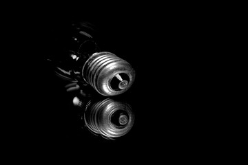 close up of light bulb on mirror