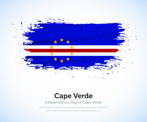 Independence day of Cape Verde country. Abstract flag in shape of paint brush stroke with shiny colored background