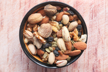 top view of mixed nut in a bowl on table 