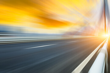 Fast moving asphalt road and bridge background.