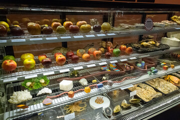 rows of fruit in a shop