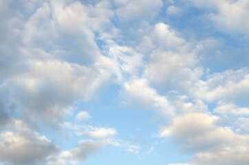 Blue summer sky white cumulus clouds background
