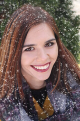 Happy smiling young woman. Wintertime portrait